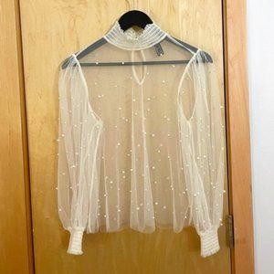 Sheer mock-neck blouse with pearl detail